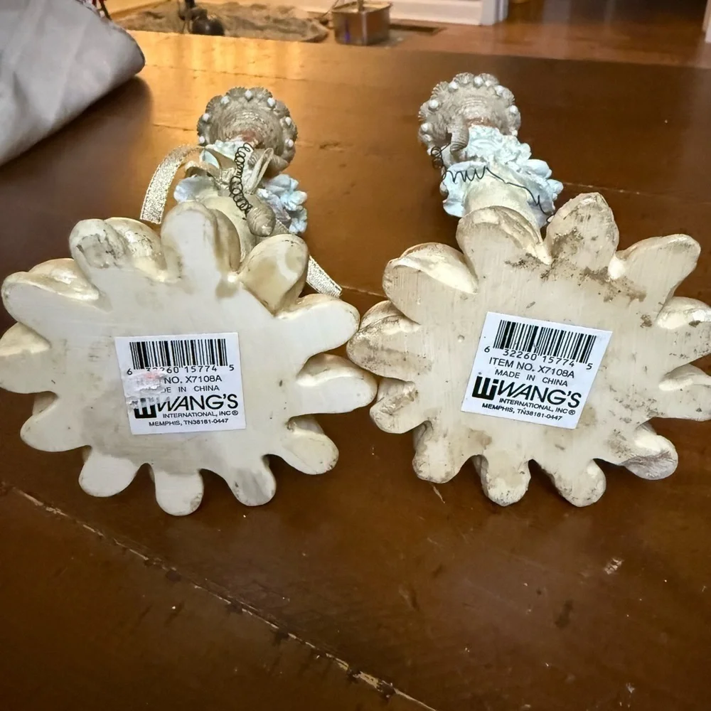 Santa at the beach candlesticks, blue and cream. Preowned